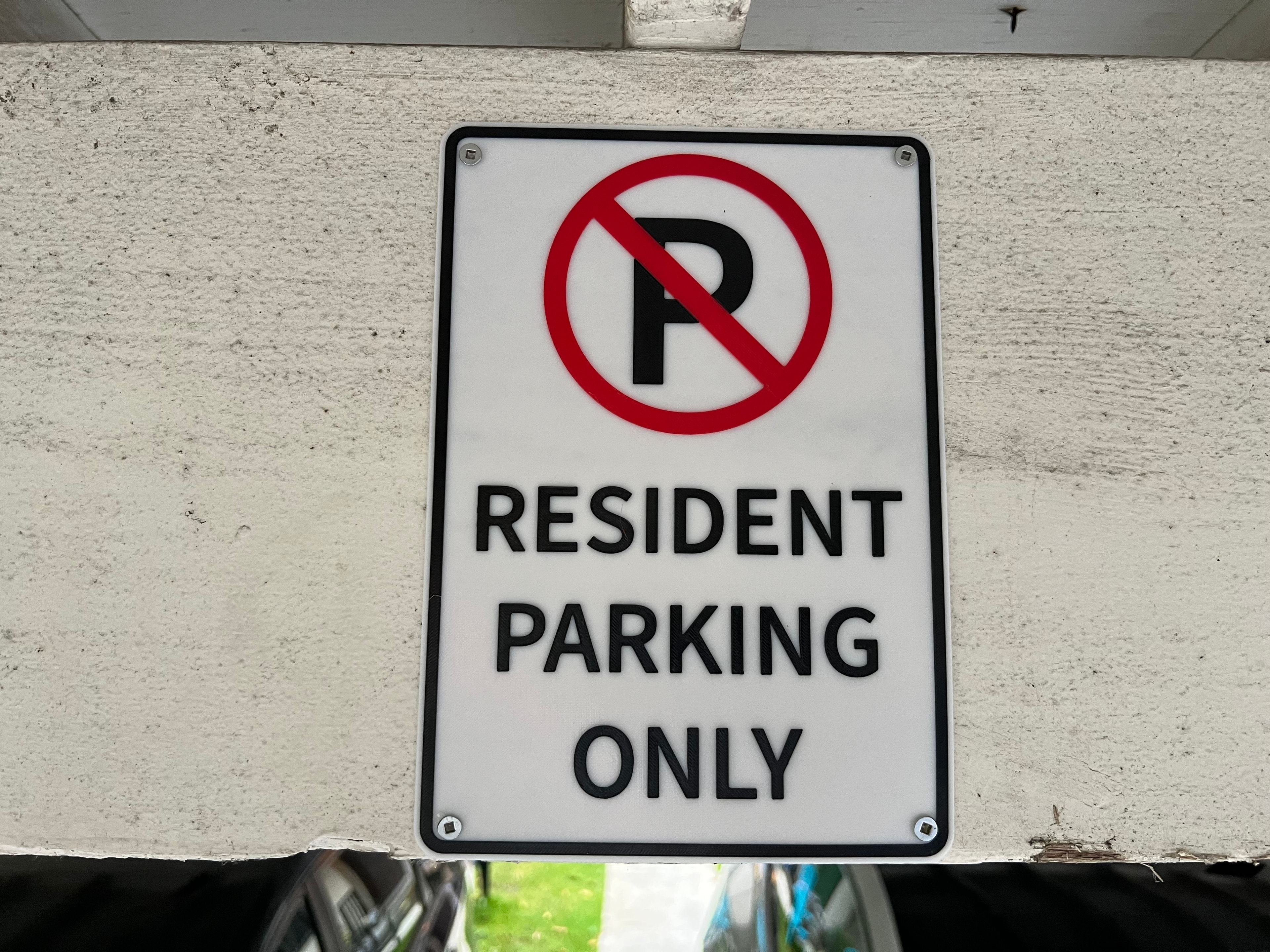 Resident only no parking sign installed in parkade