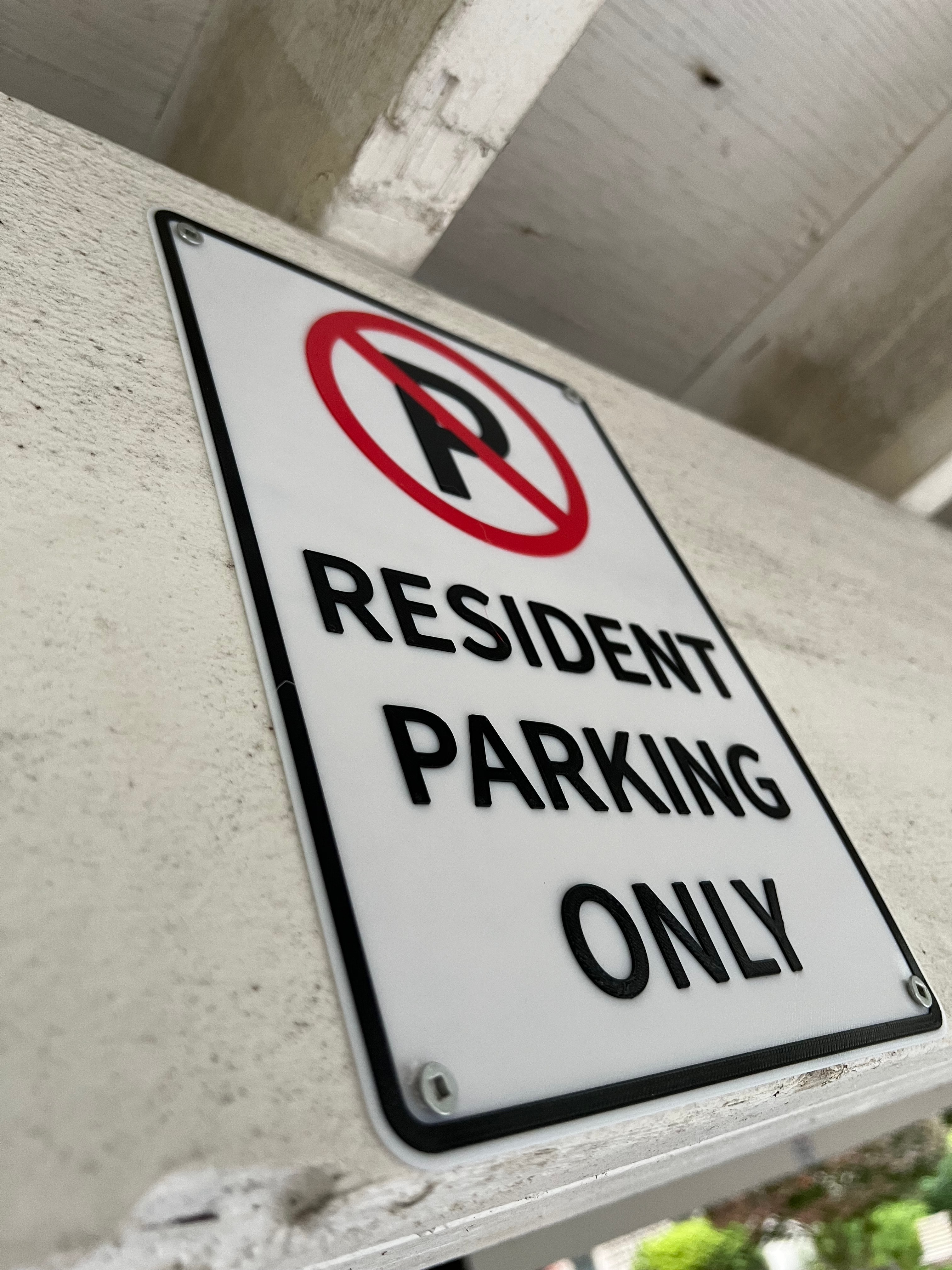 Off angle photo resident only parking installed in parkade
